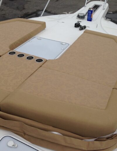 Ratcheting bow cushions with Bimini top